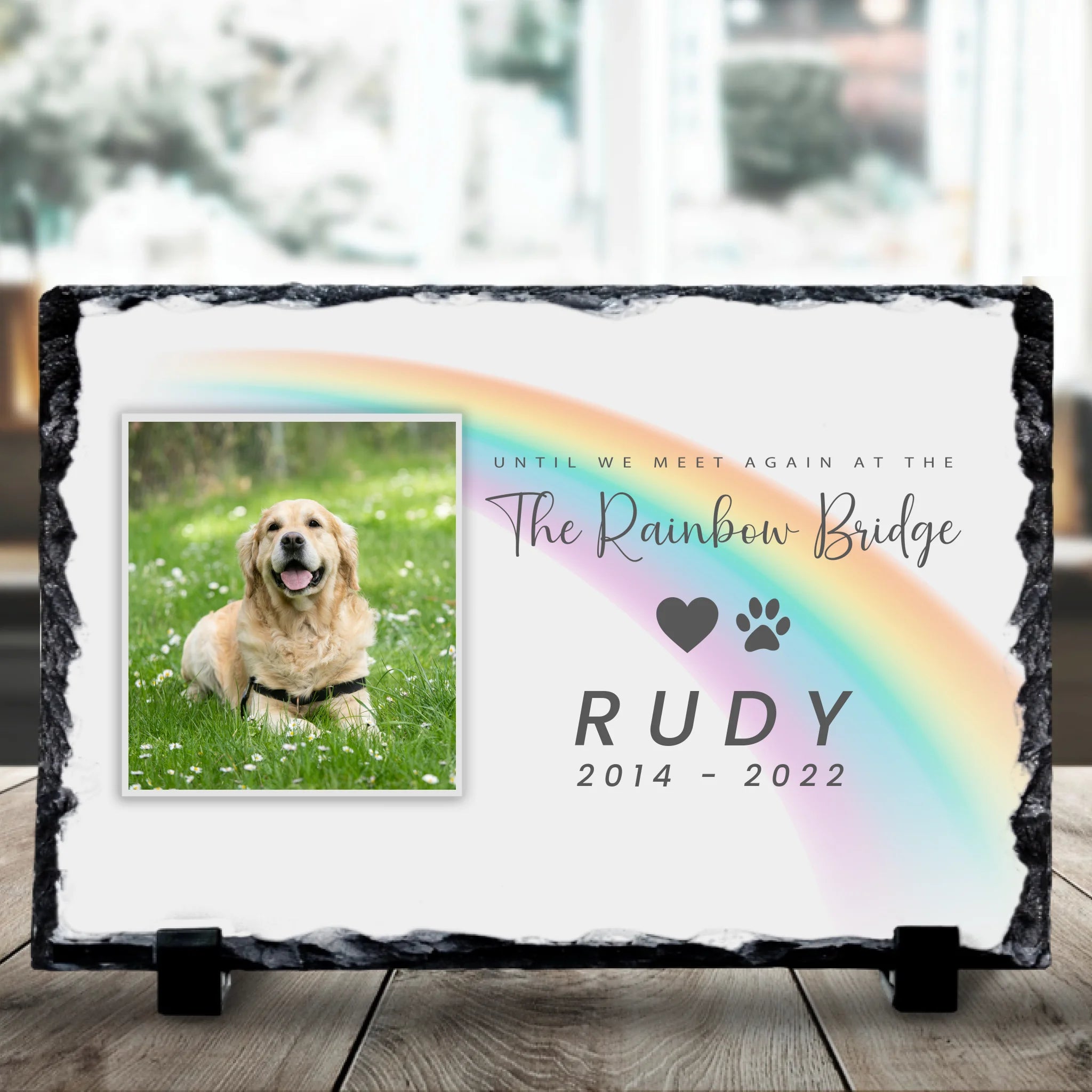 Close-up of a custom pet memorial photo slate showing personalised name and photo detail