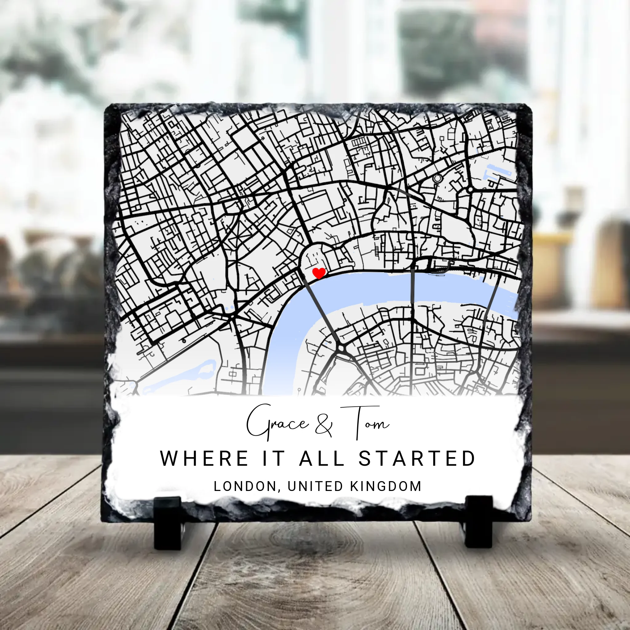 Personalised photo slate showing a custom map with location markers and couple's names