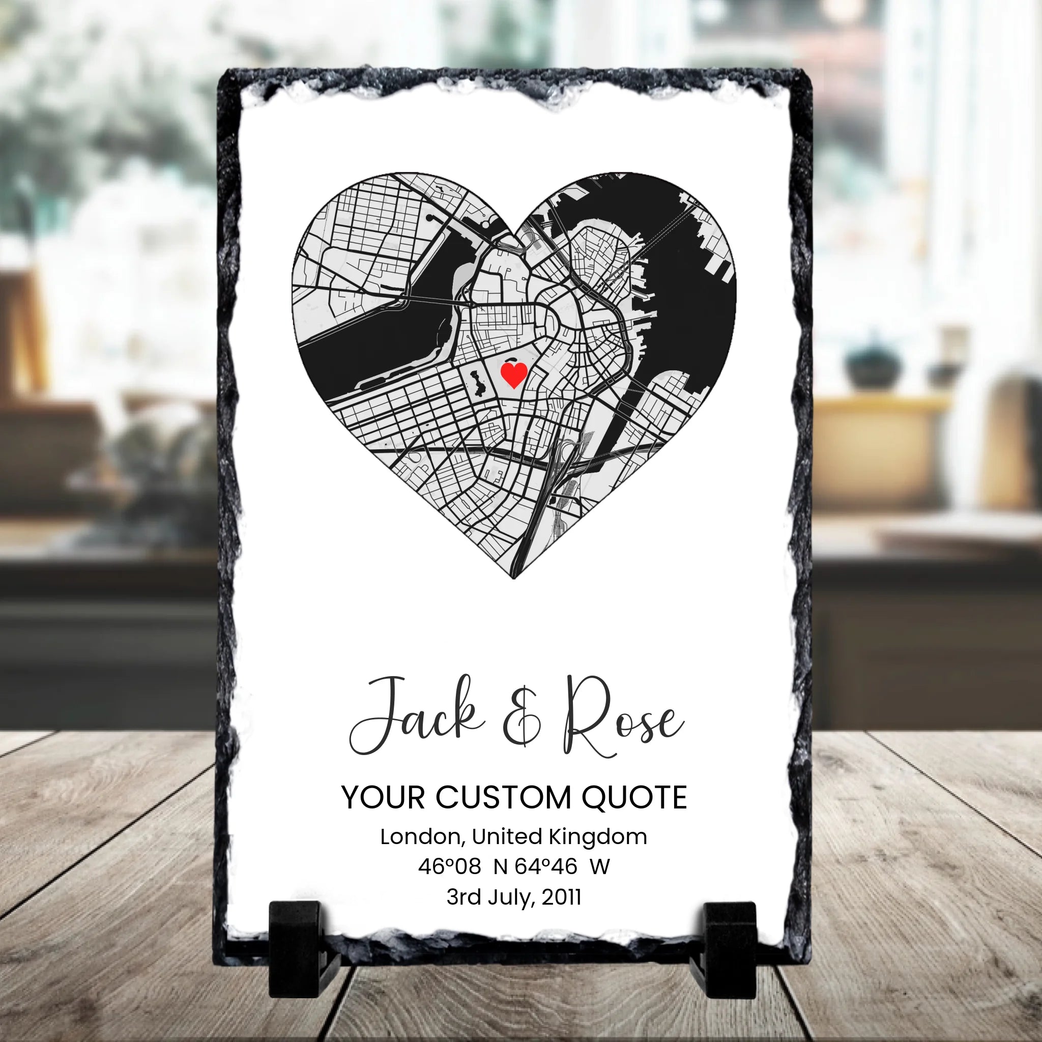 Personalised heart map photo slate with custom coordinates and quote, displayed as couple wall art