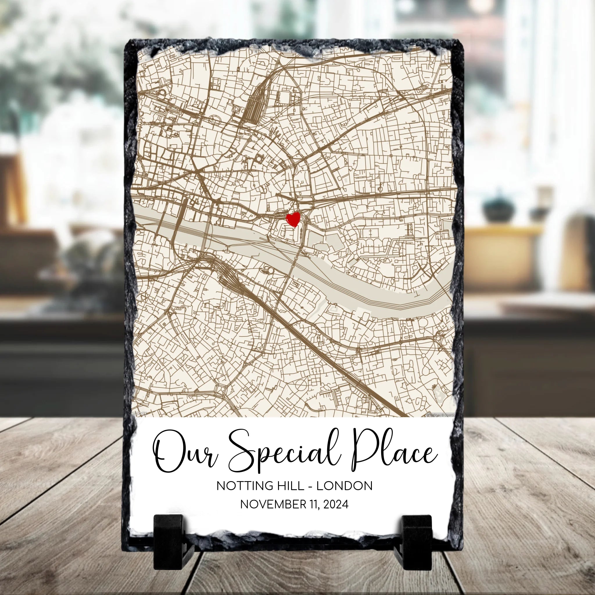 Close-up of a personalised photo slate with map print and heart marker keepsake