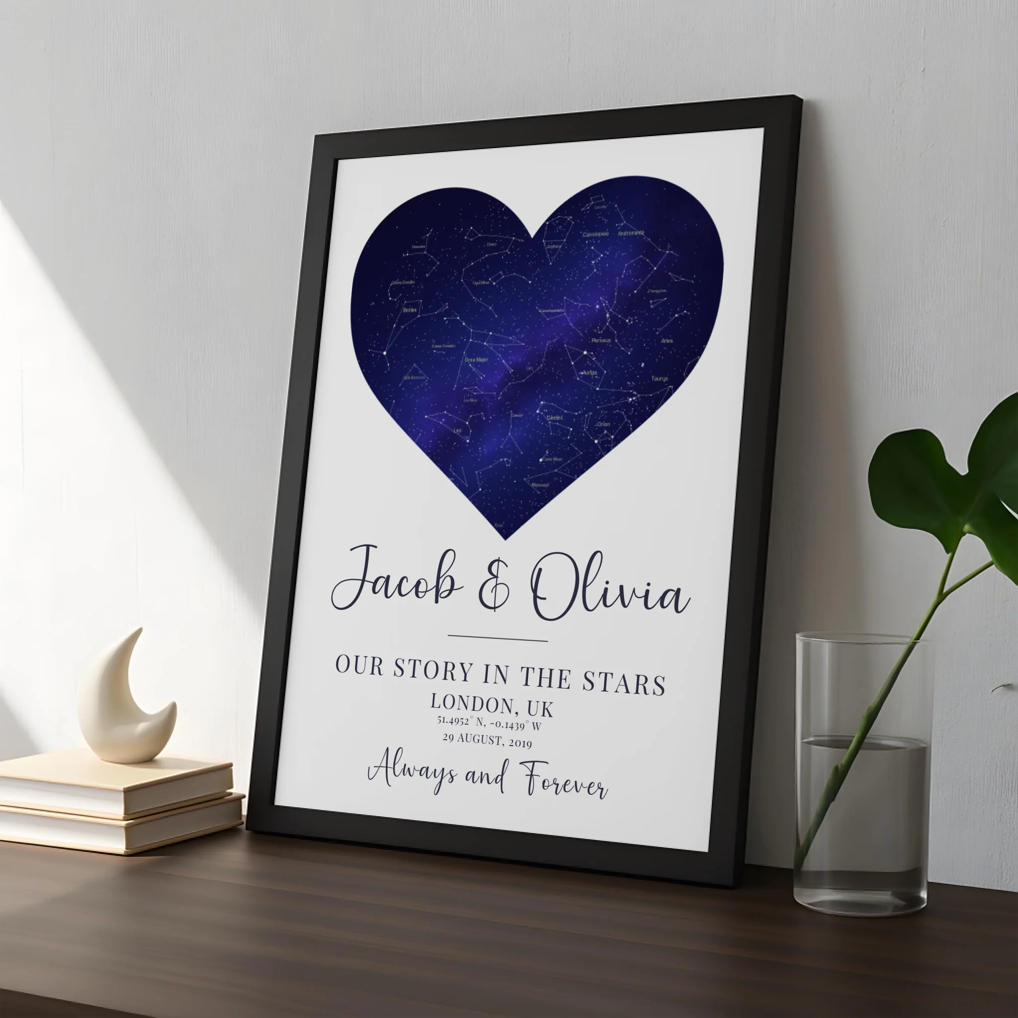 Custom heart star map print in a white frame personalised with names and a date