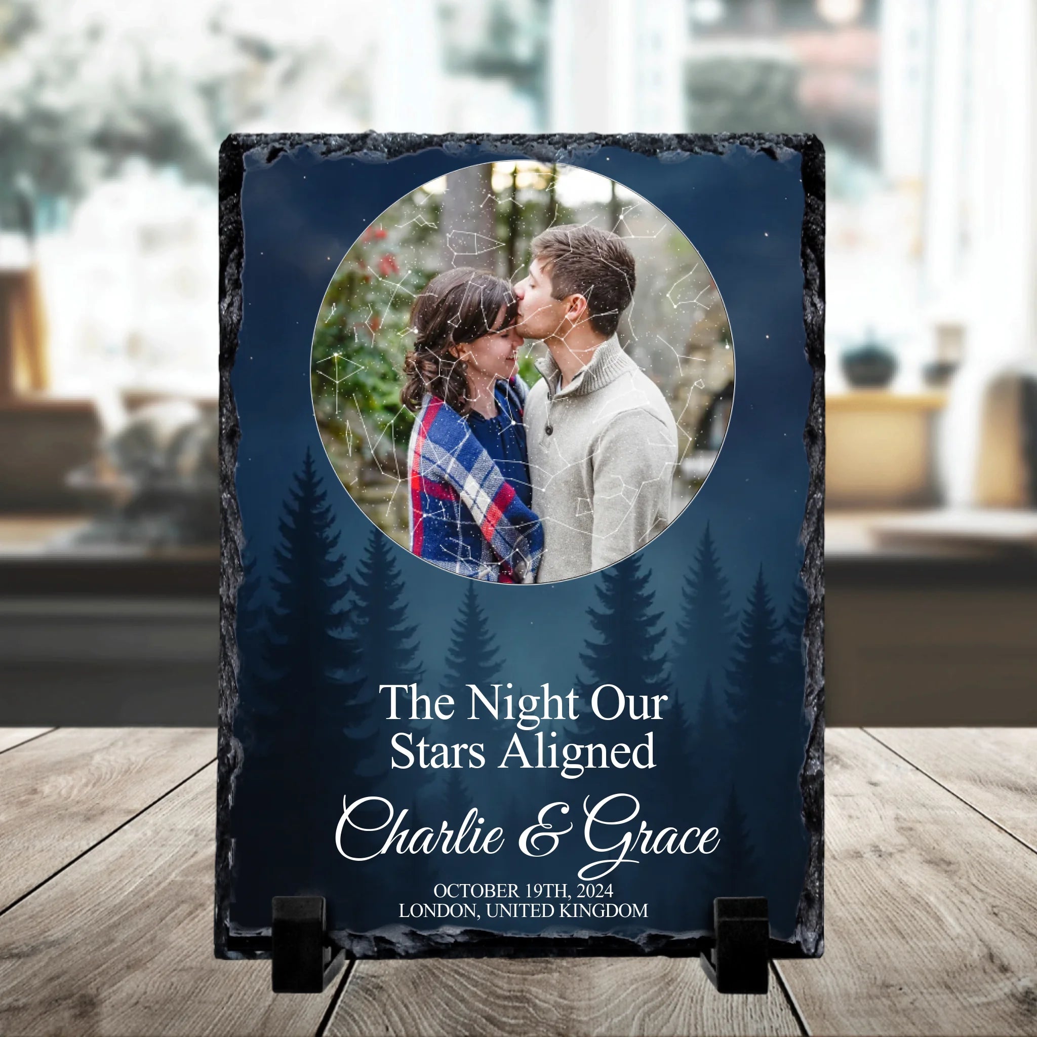 Close-up of custom photo slate showing night sky design with personalised text and couple's photo