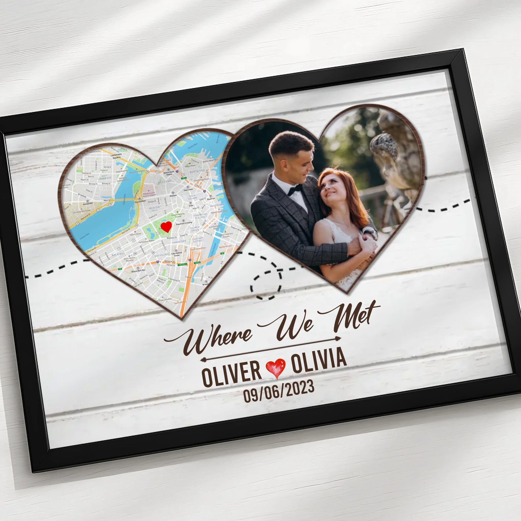 Custom framed map and photo print displayed on a wall as couple's wall art
