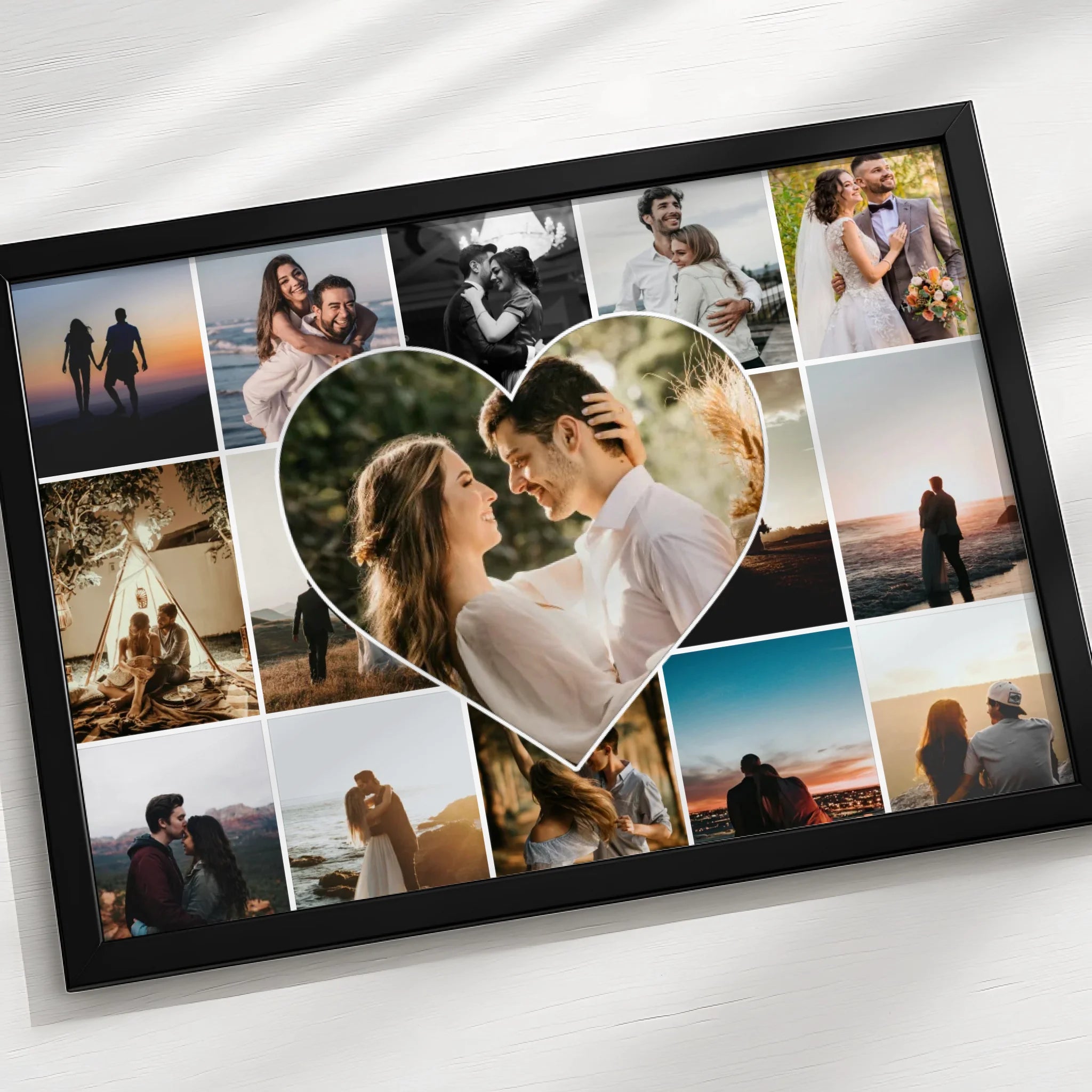 Custom photo collage print in heart design shown as a framed wall gift