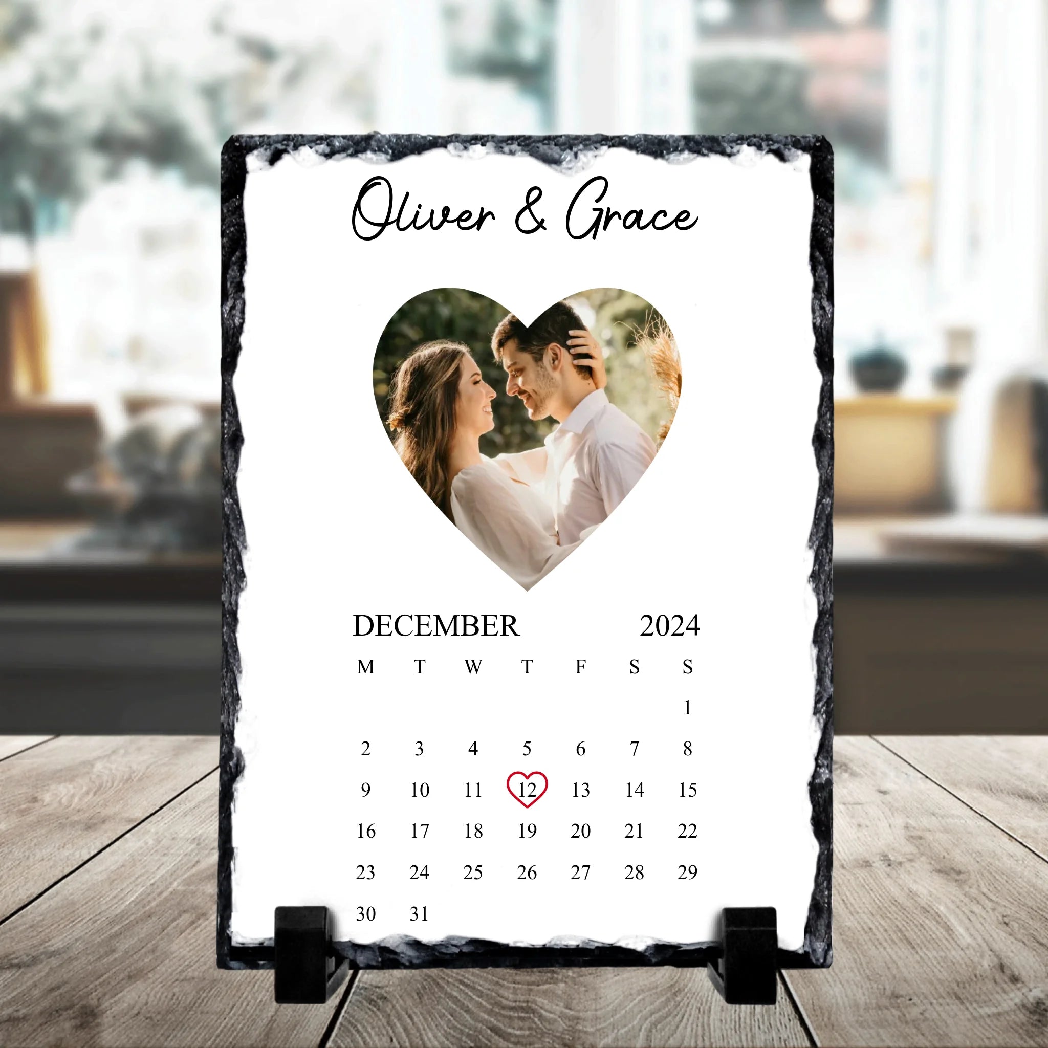 Close-up of a custom photo slate gift showing personalised text and photo detail