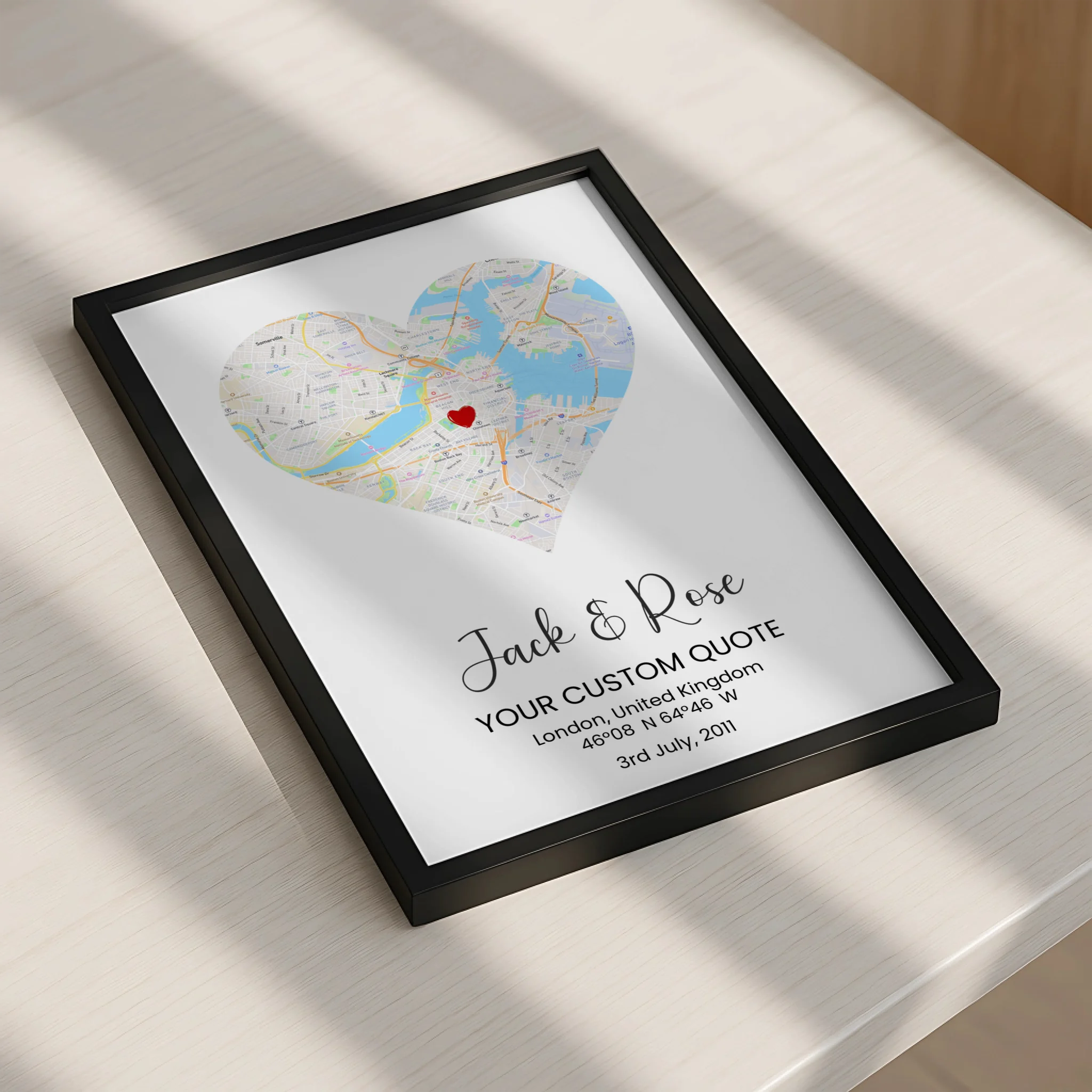 Personalised street map print in a heart shape displayed on a living room wall