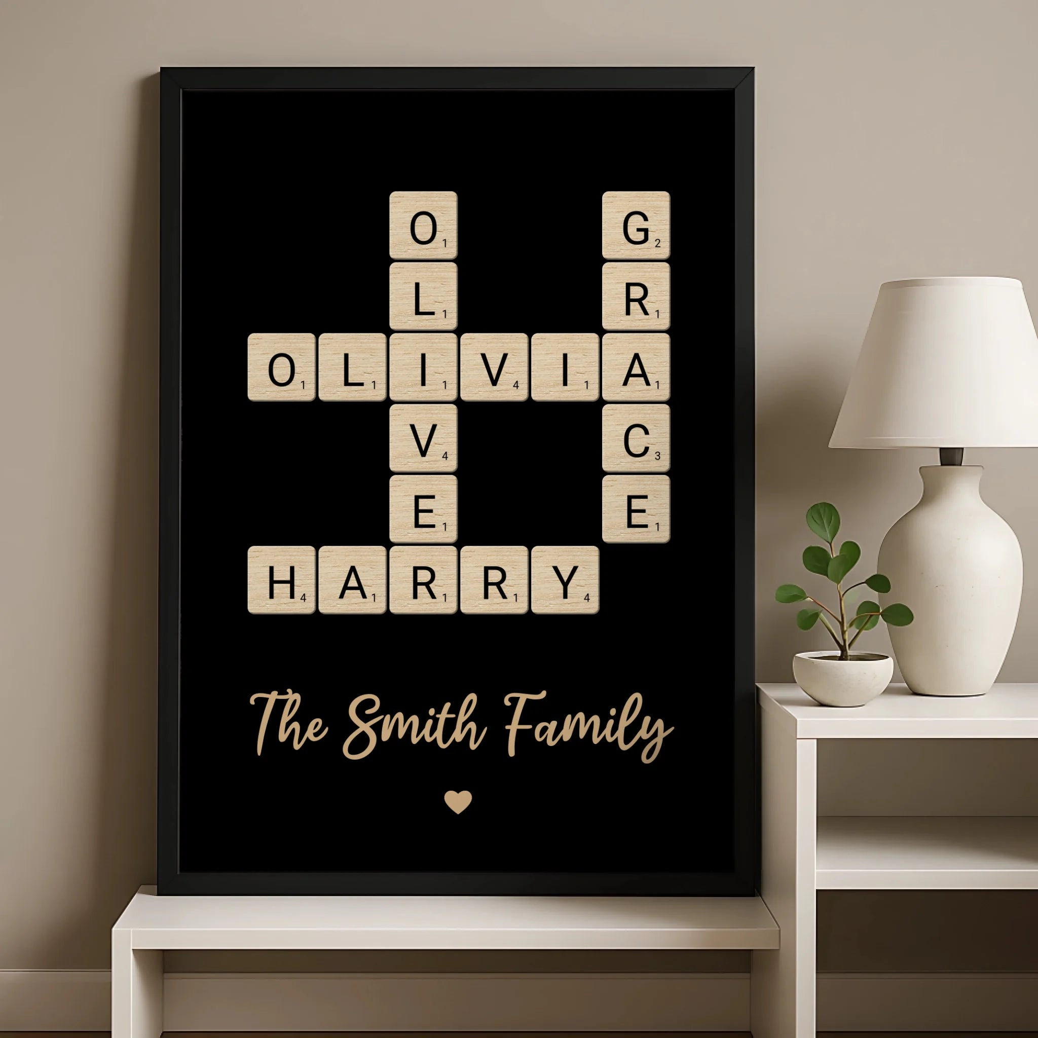 Family name crossword wall art in a wooden tile style frame hung on a wall