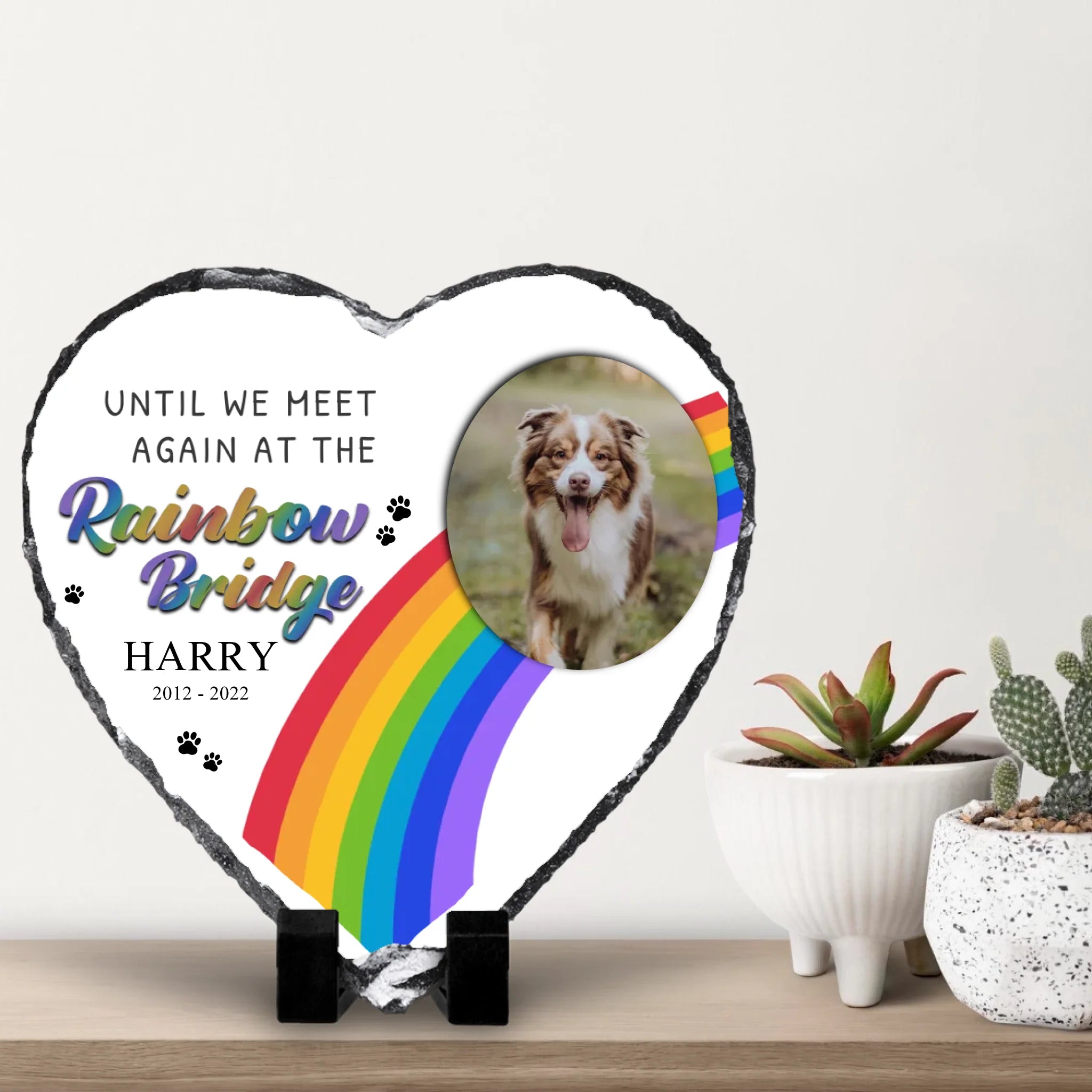 Heart shaped pet memorial photo slate displayed on a shelf