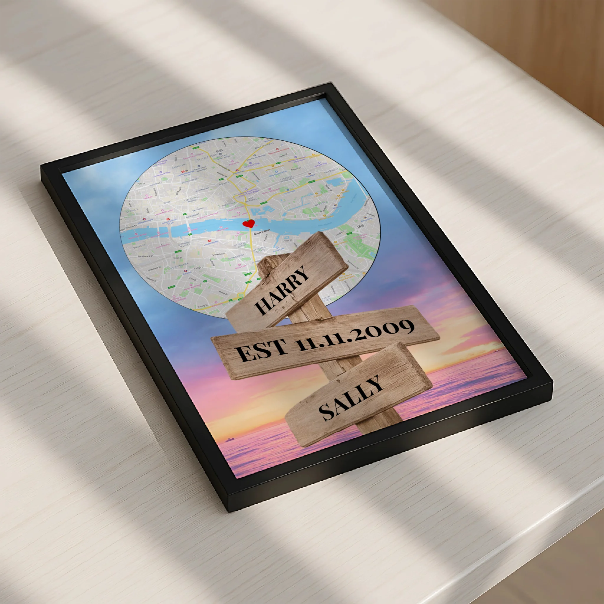 Personalised map print showing couple names and wedding date on a signpost style wall art