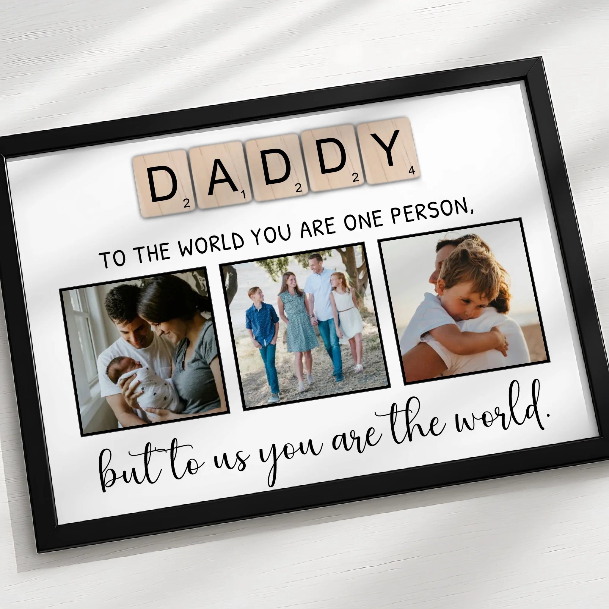 Personalised photo frame with DADDY tile print on white background