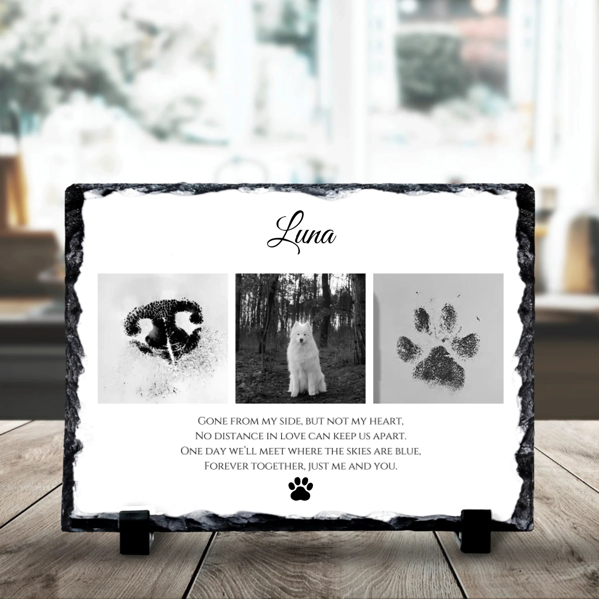 Close-up of a personalised photo slate showing black and white pet memorial photos