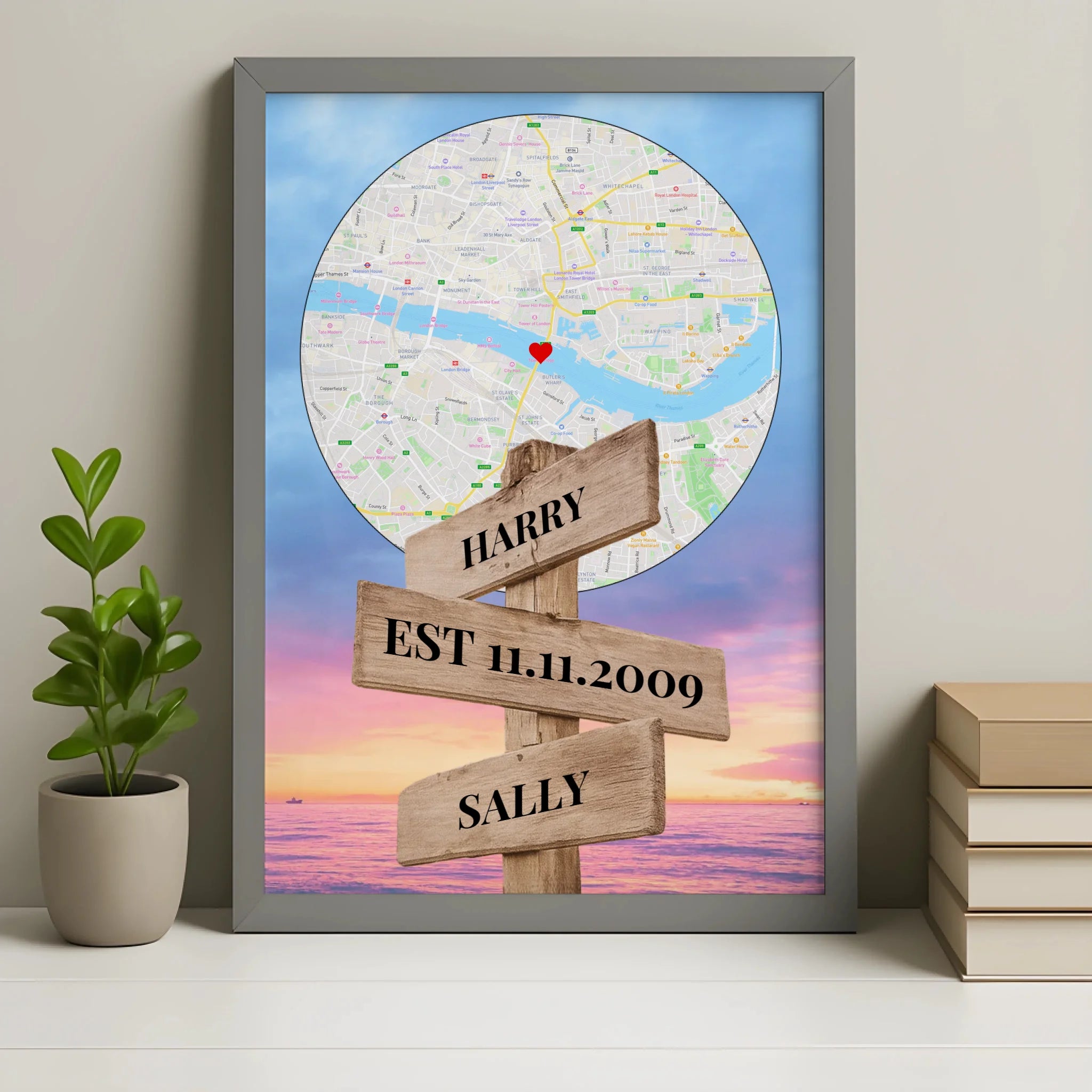 Personalised map print in a grey frame showing a custom location and names on a signpost