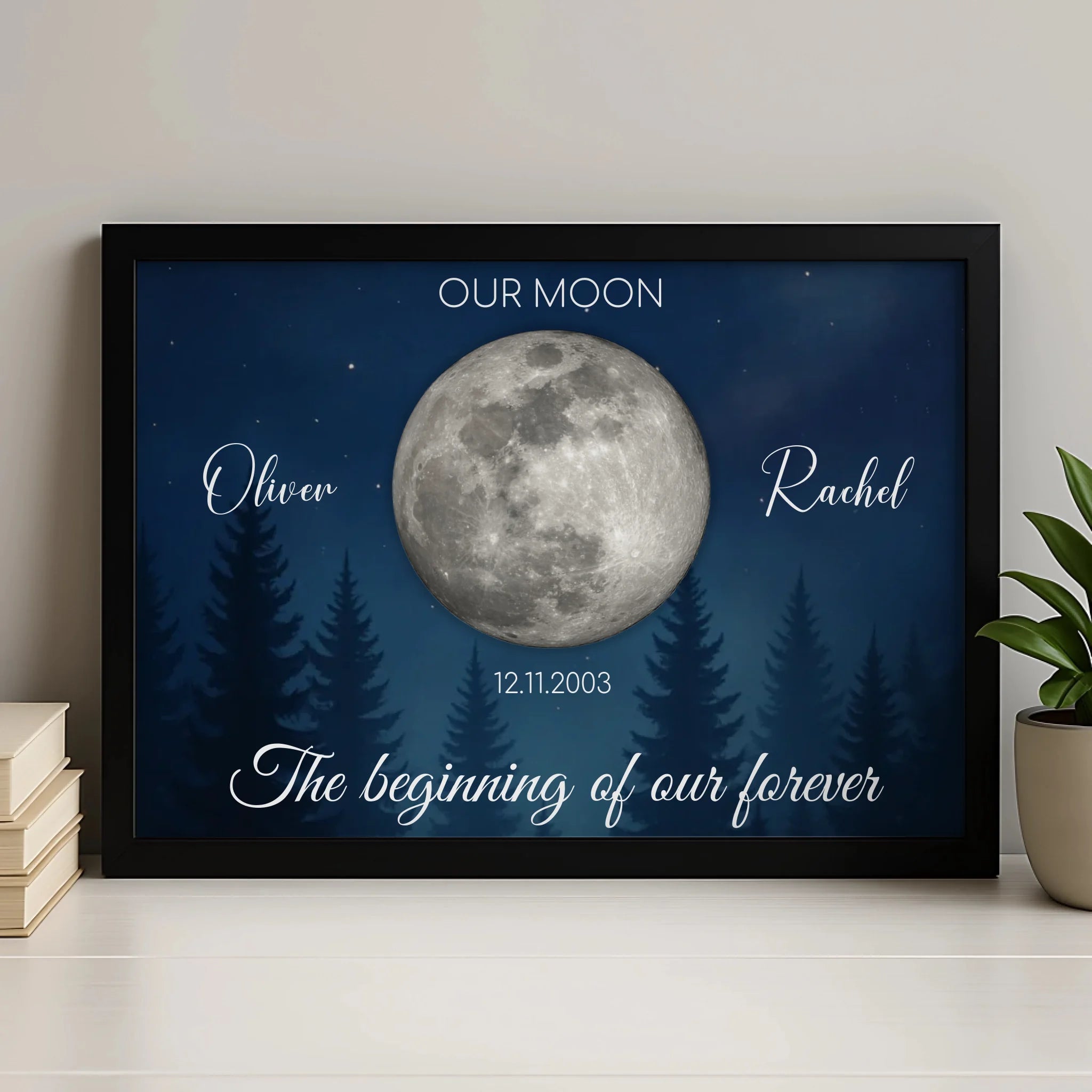 Personalised moon phase print with custom names and date displayed in a white photo frame