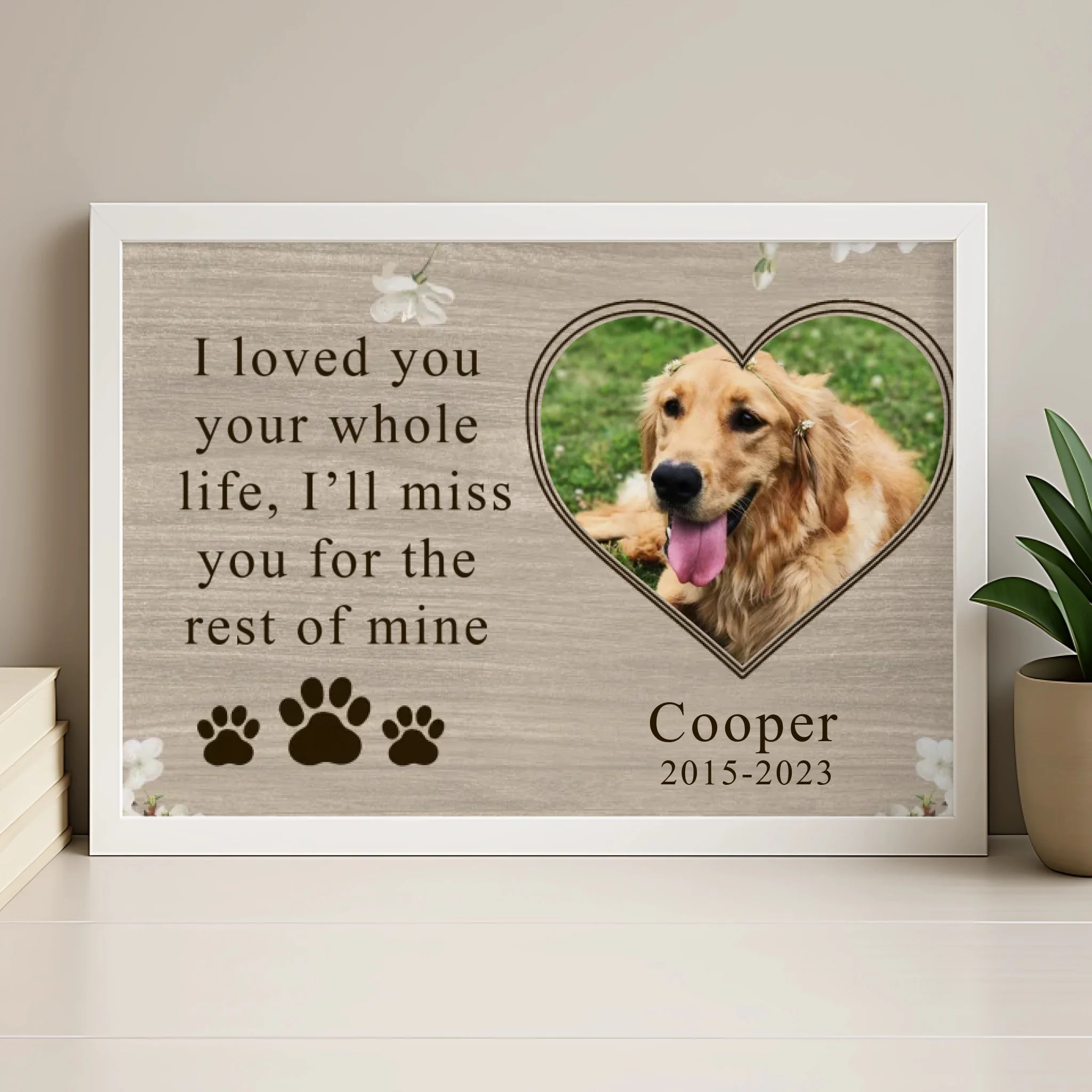 Personalised pet memorial frame in wood finish with custom photo and pawprints design