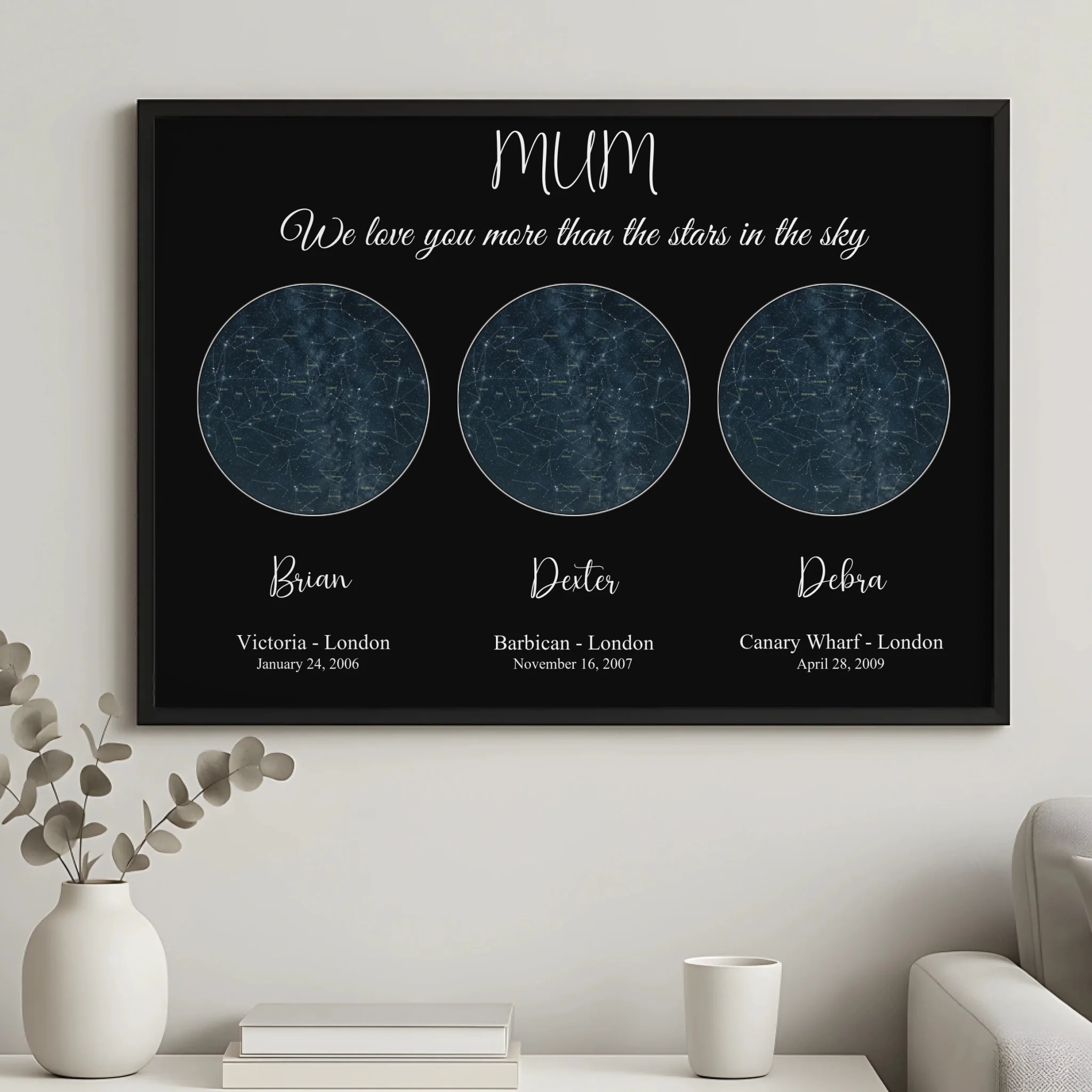 Personalised star map print in a white frame with two custom night sky charts and names
