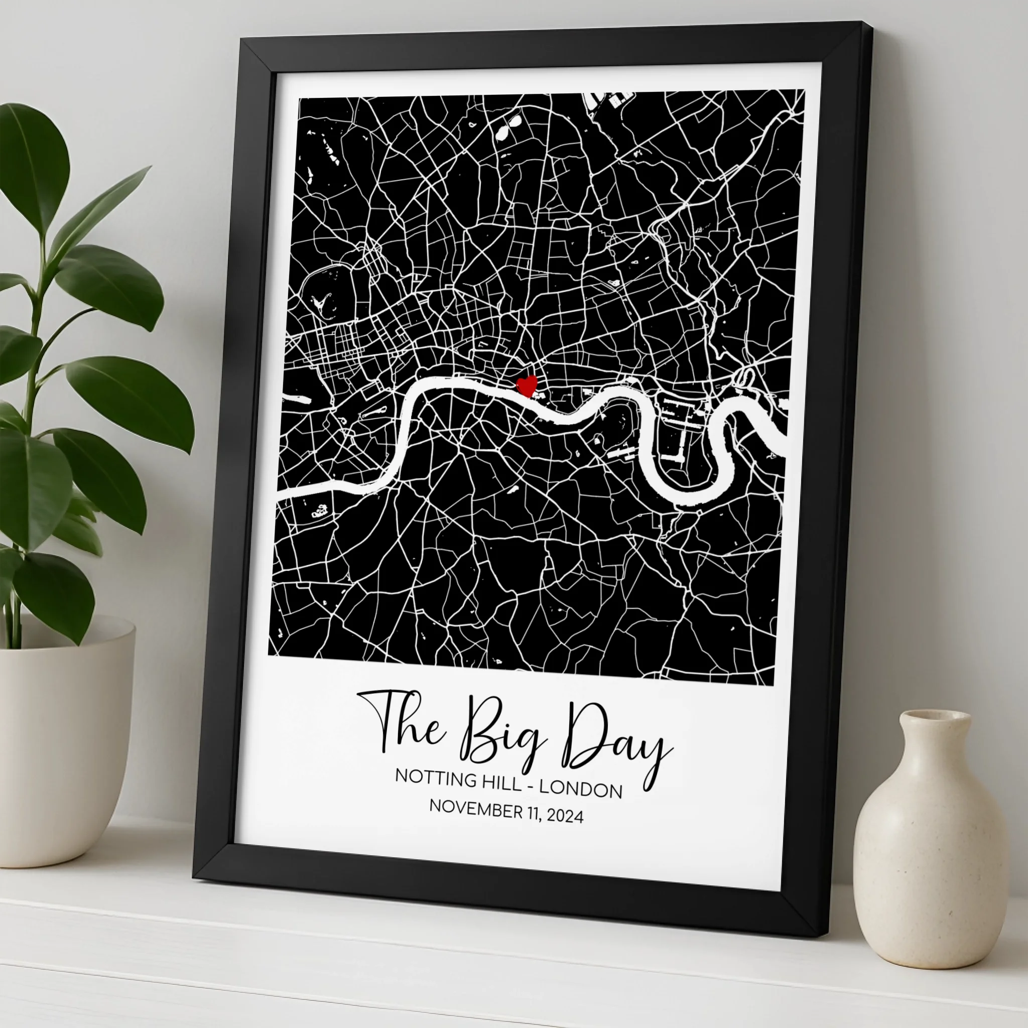 Custom location map print in a photo frame showing personalised names and a special date