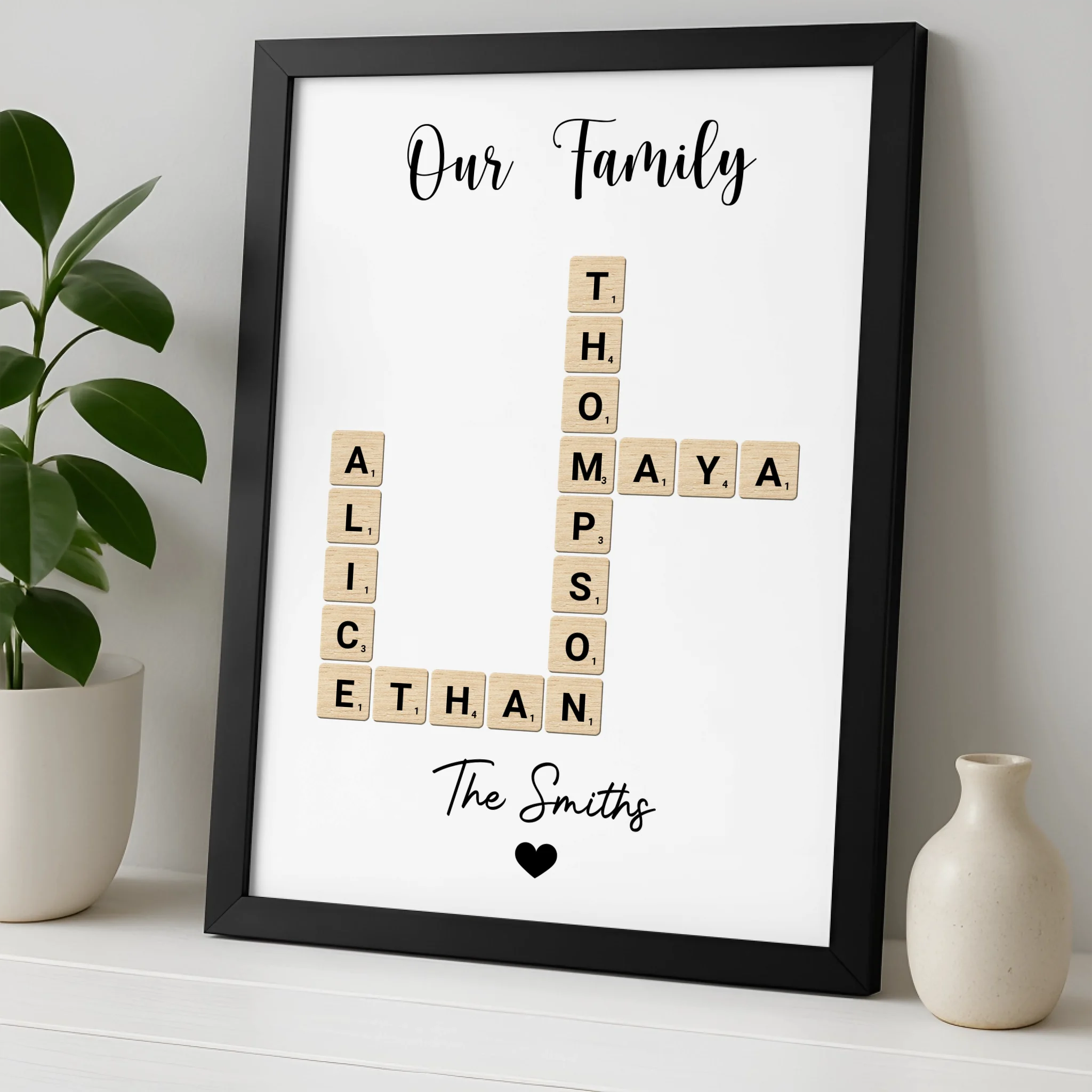 Custom family crossword photo frame displayed on a wall as home decor