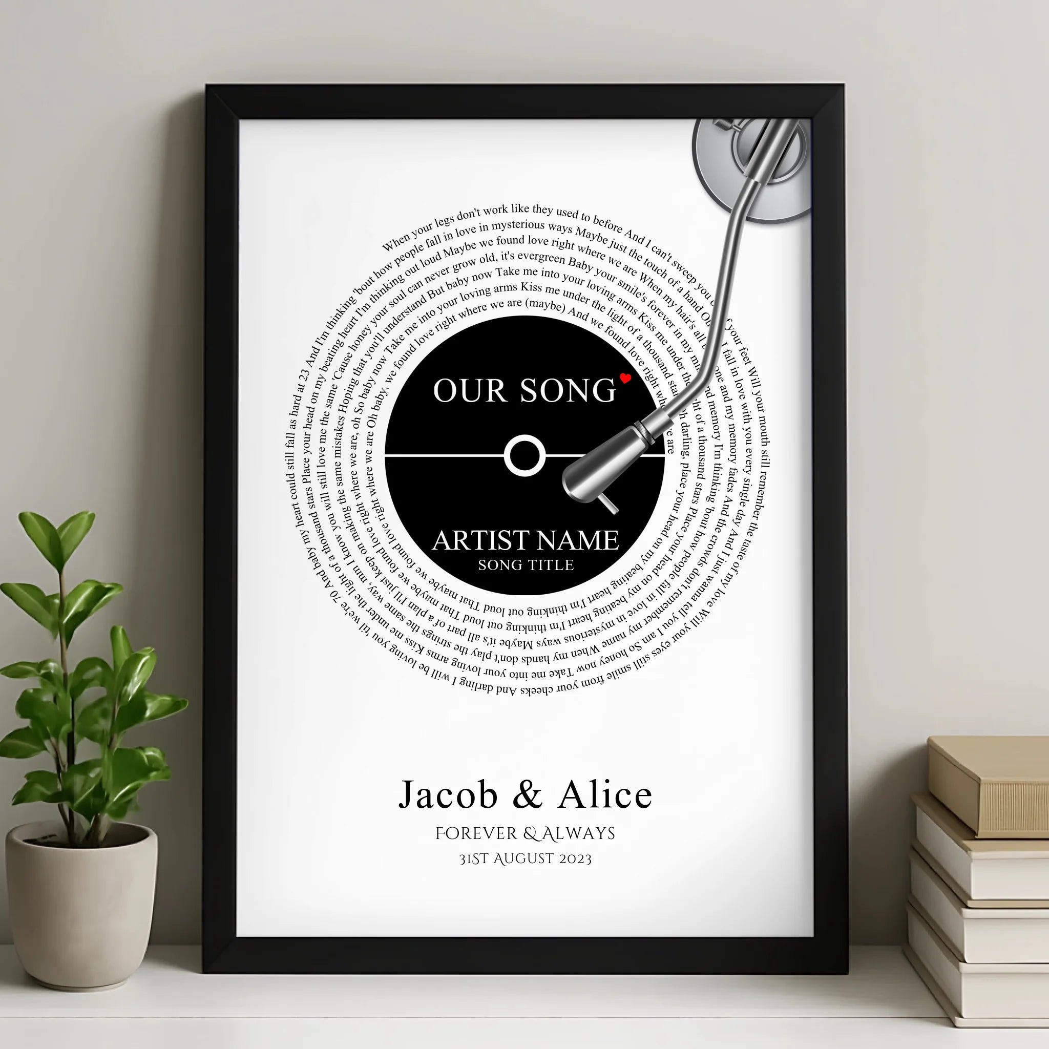 Black framed personalised vinyl record song lyrics print reading Our Song, Jacob & Alice, Forever & Always, 31st August 2023,