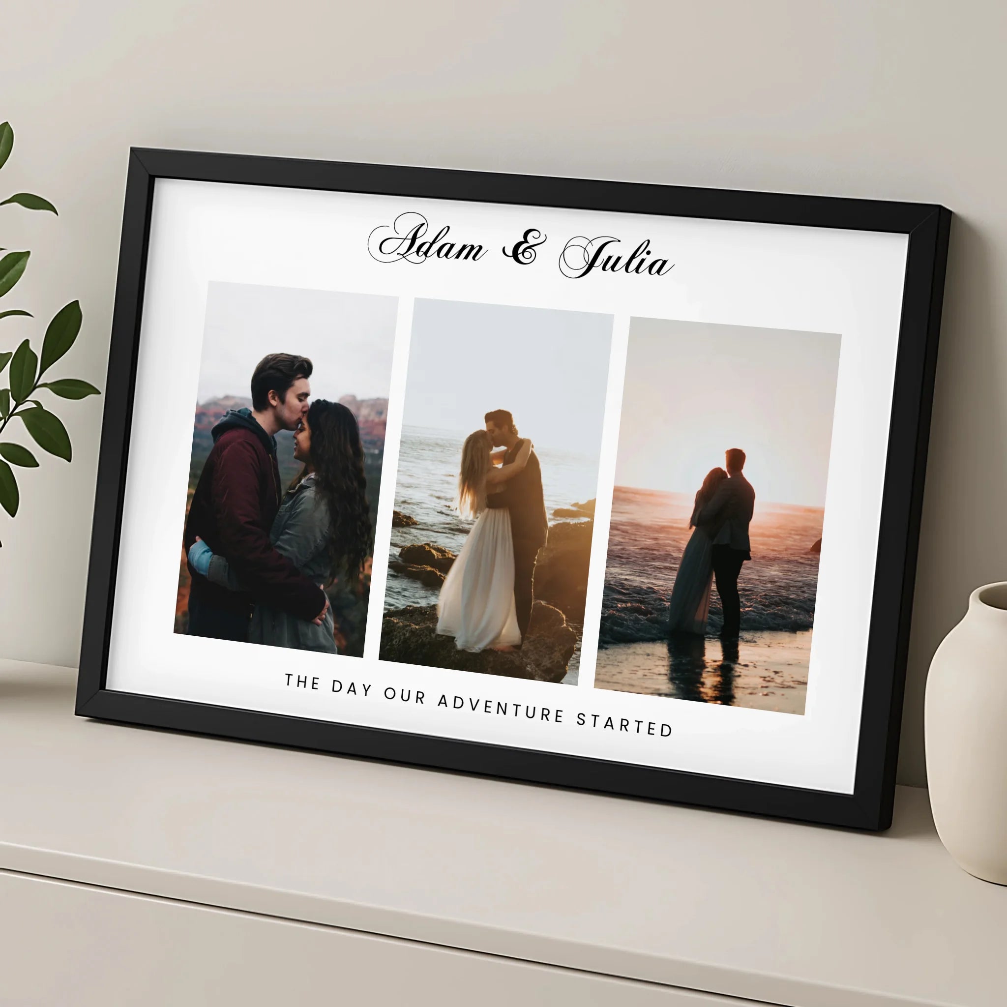 Black framed personalised 3-photo couple print for Adam and Julia, displayed on a shelf beside a white vase and green foliage