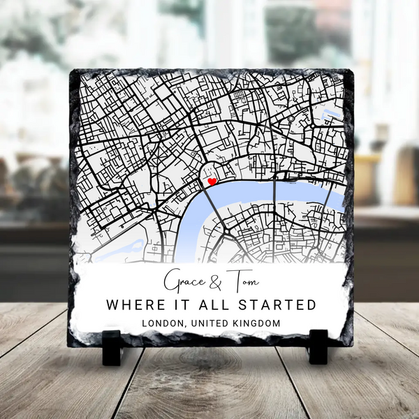 Personalised photo slate showing a custom map with location markers and couple's names