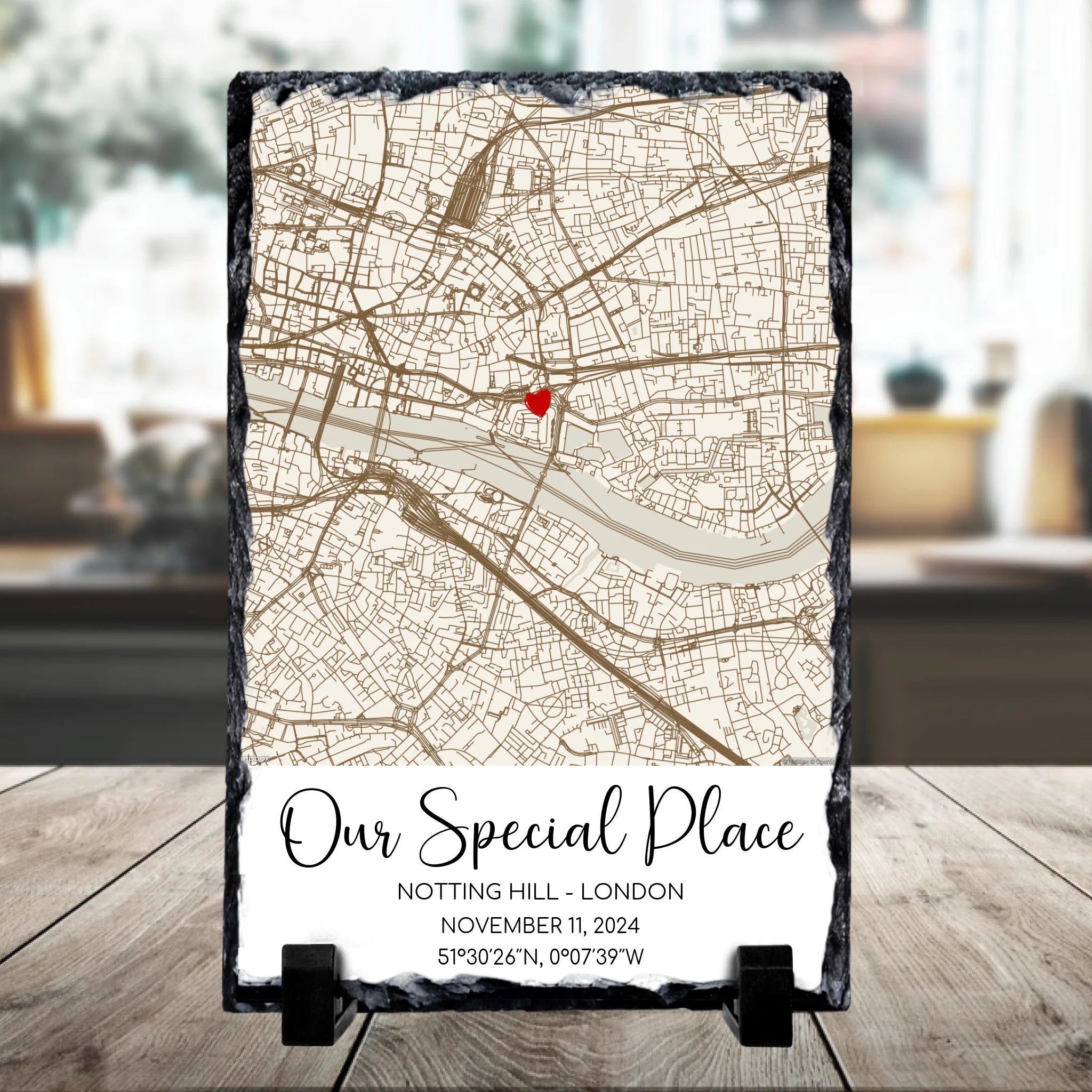 Personalised photo slate with a custom map location print, names, date and heart marker on rustic stone