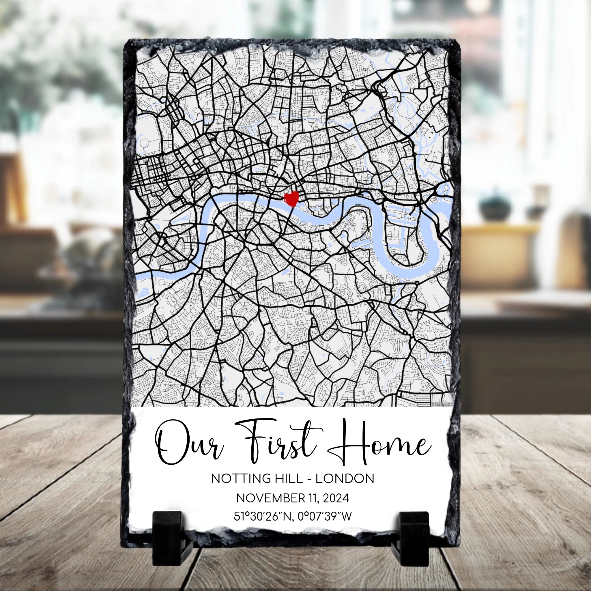 Personalised photo slate showing a custom map print with a heart marker, names, date and coordinates on rectangular slate