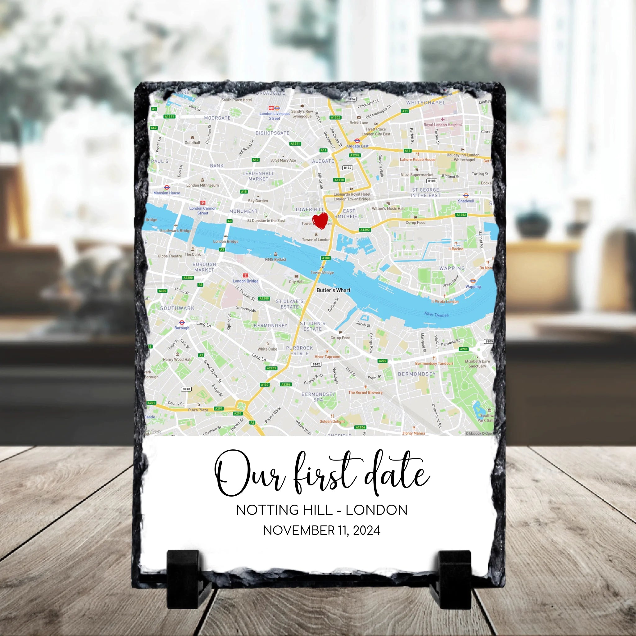 Custom location photo slate gift showing a map print with heart marker and personalised names and date