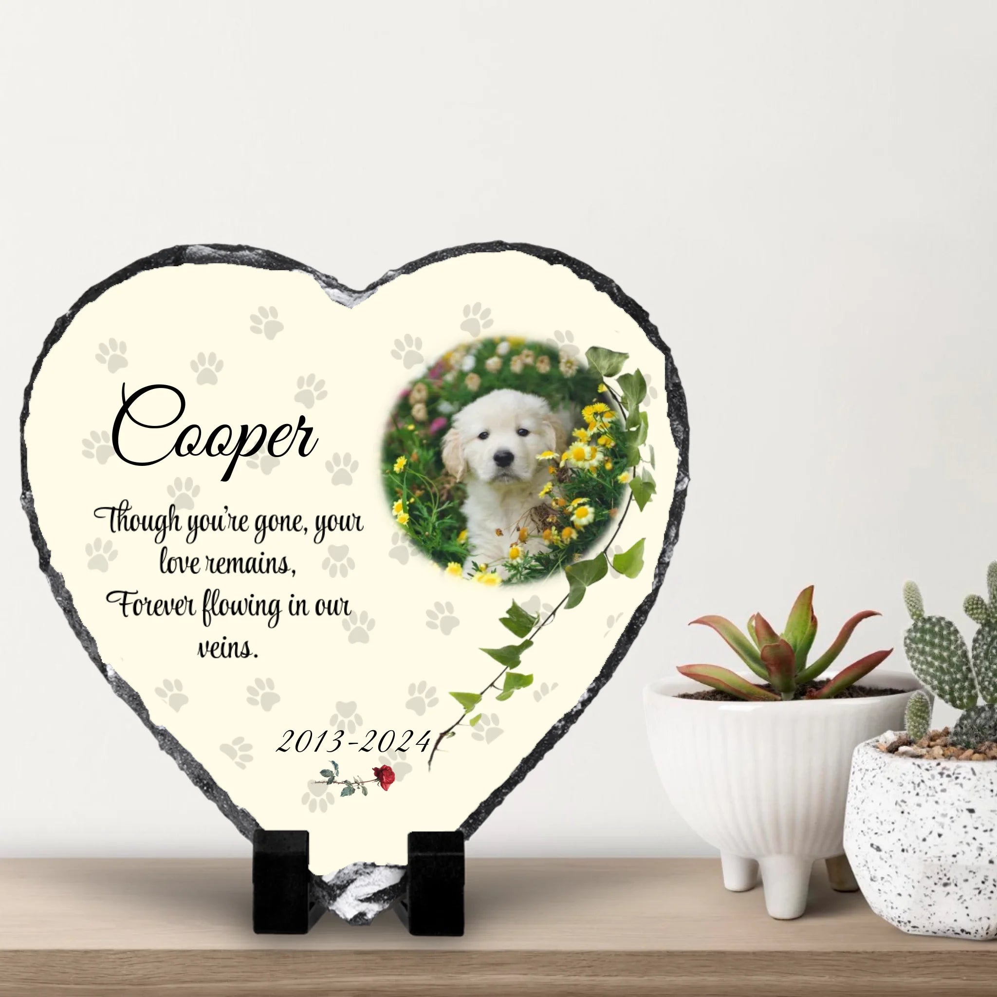 Heart shaped personalised photo slate displayed on a shelf with small cacti and a white wall background