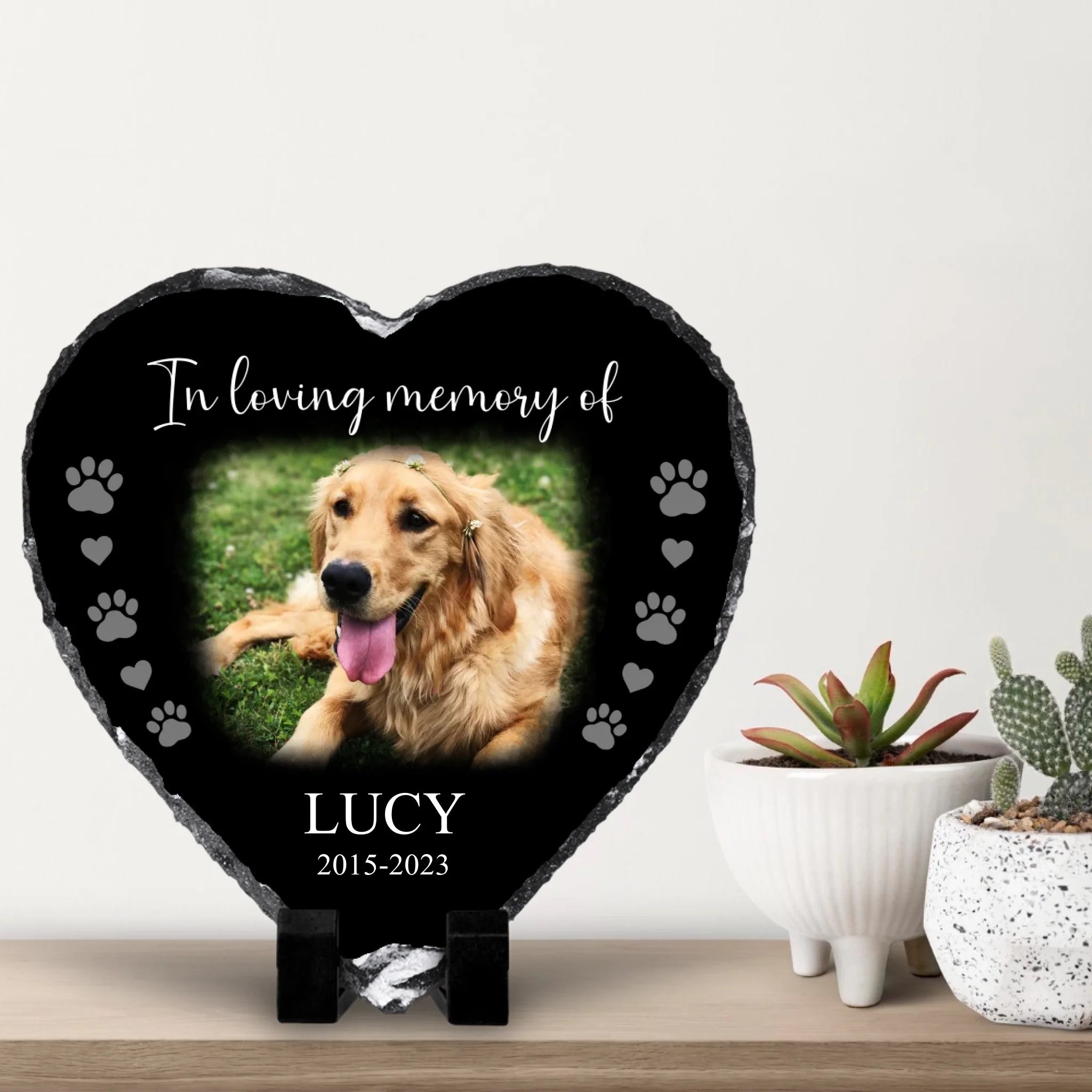 Personalised heart shaped photo slate displayed on a shelf with small cacti