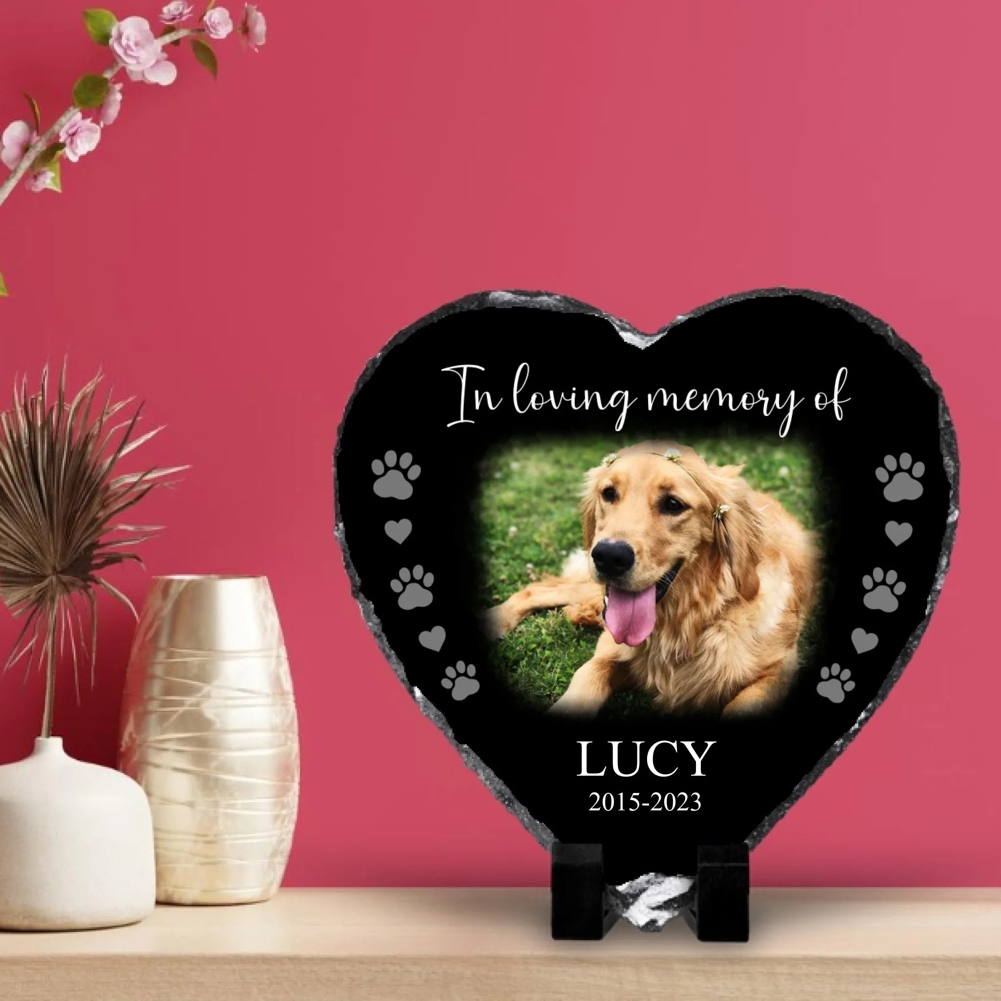 Heart shaped personalised photo slate on a wooden kitchen shelf against a coloured wall