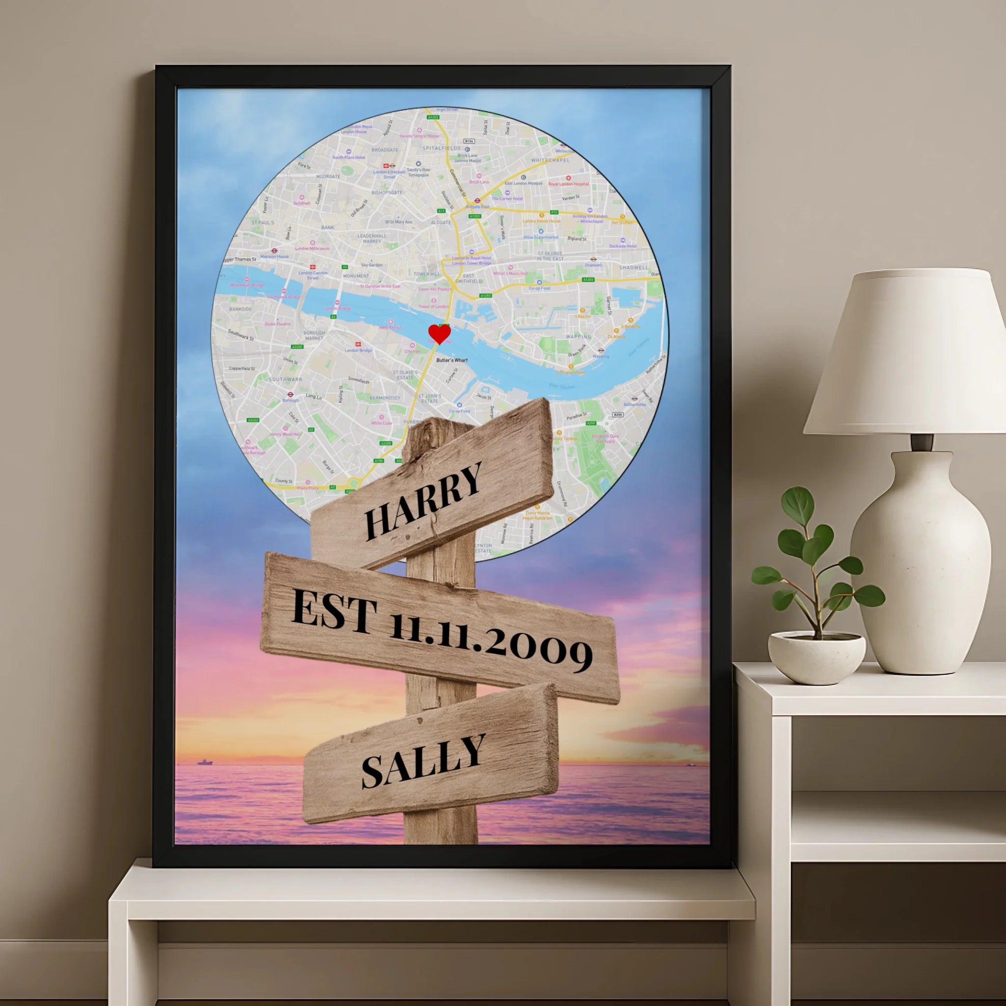 Framed personalised map print with location and names, shown as a wedding or anniversary gift
