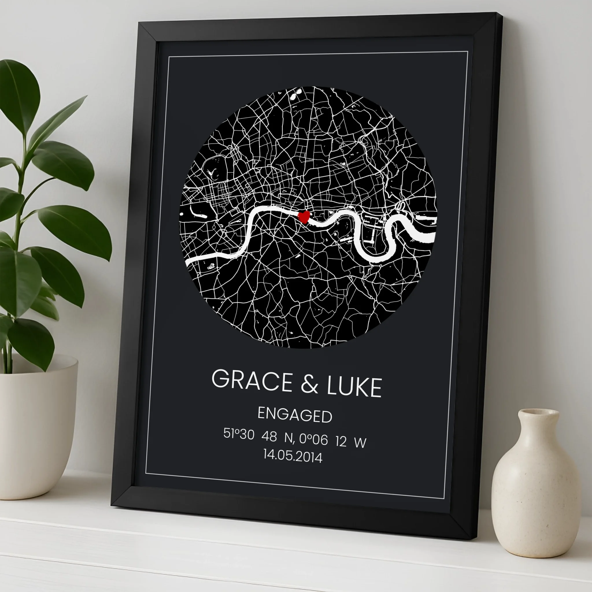 Custom map print framed with personalised coordinates and couple names