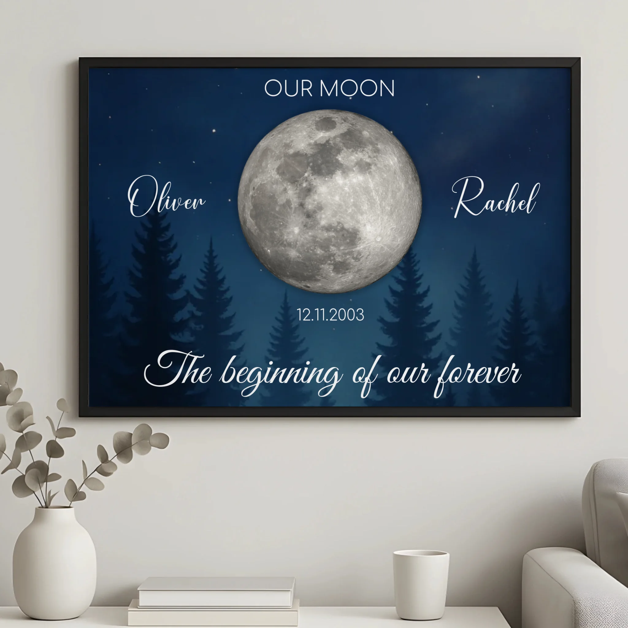 Personalised moon phase print in a white frame showing names, date and a custom quote