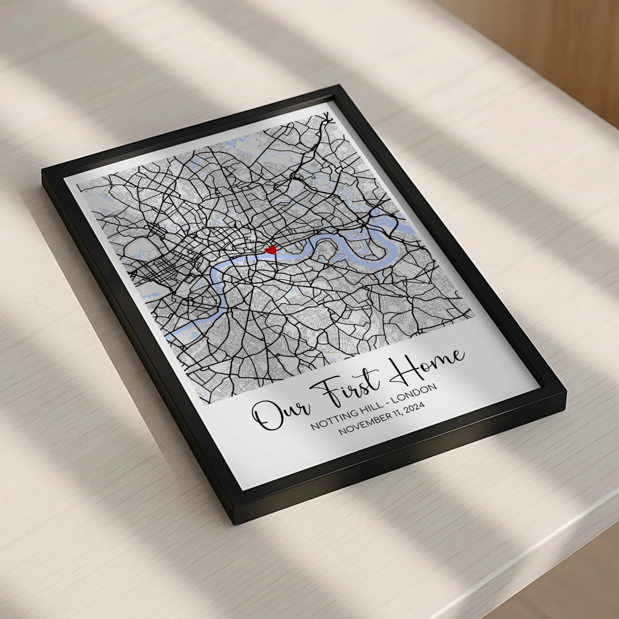 Personalised map print in a frame displayed on a shelf as a wedding keepsake
