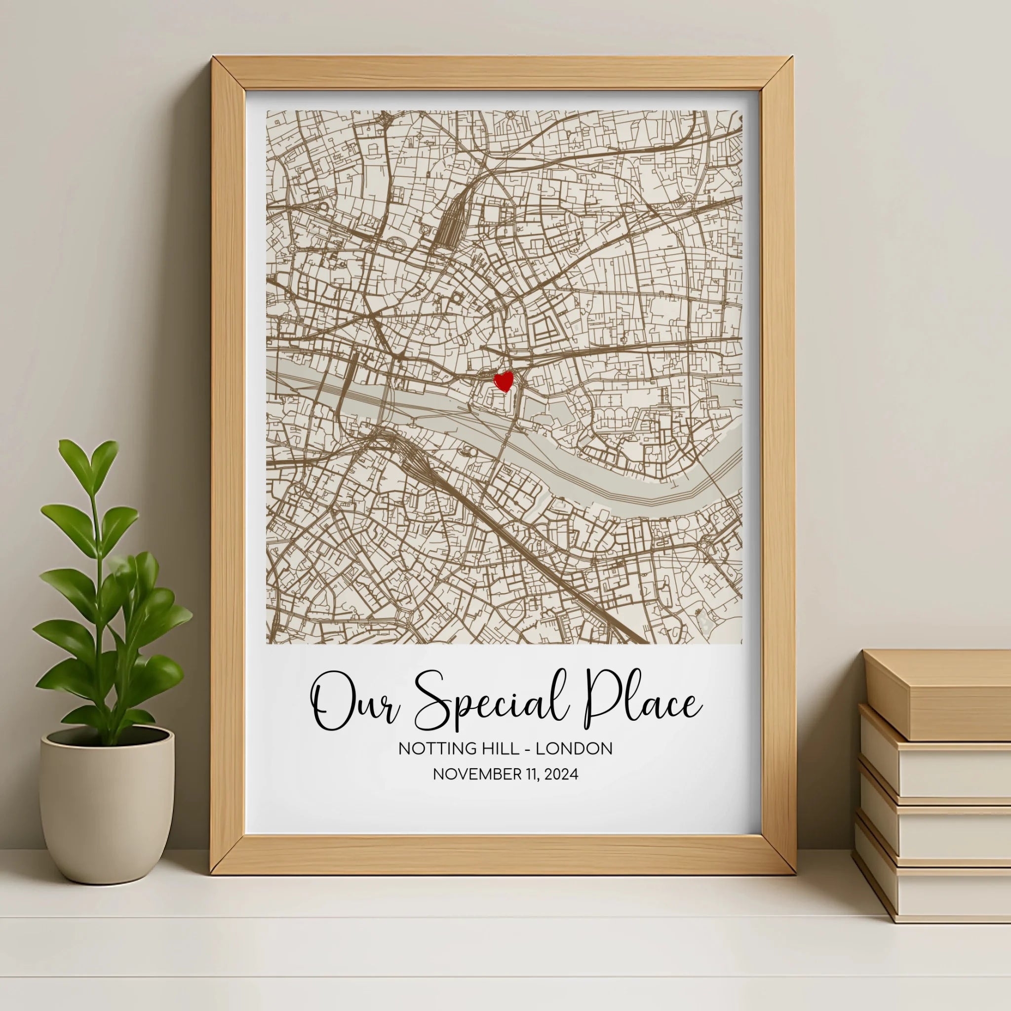 Oak framed personalised location map print with heart marker detail and couples names