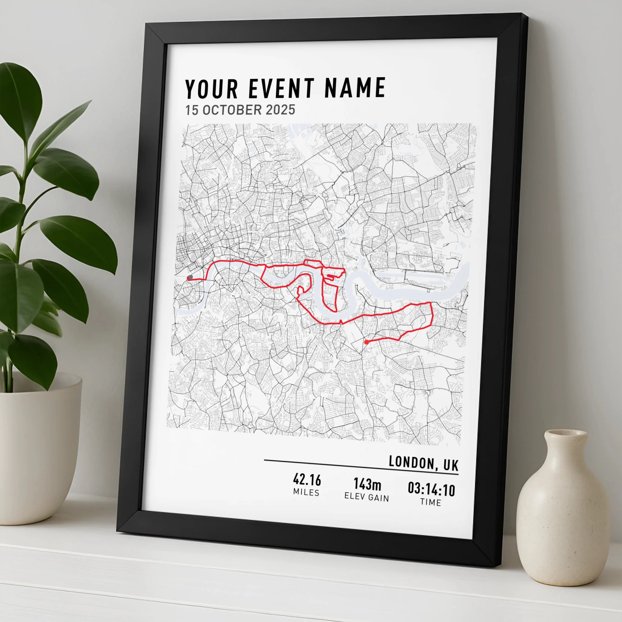 Custom GPX route map print framed on a wall, black and white minimal design