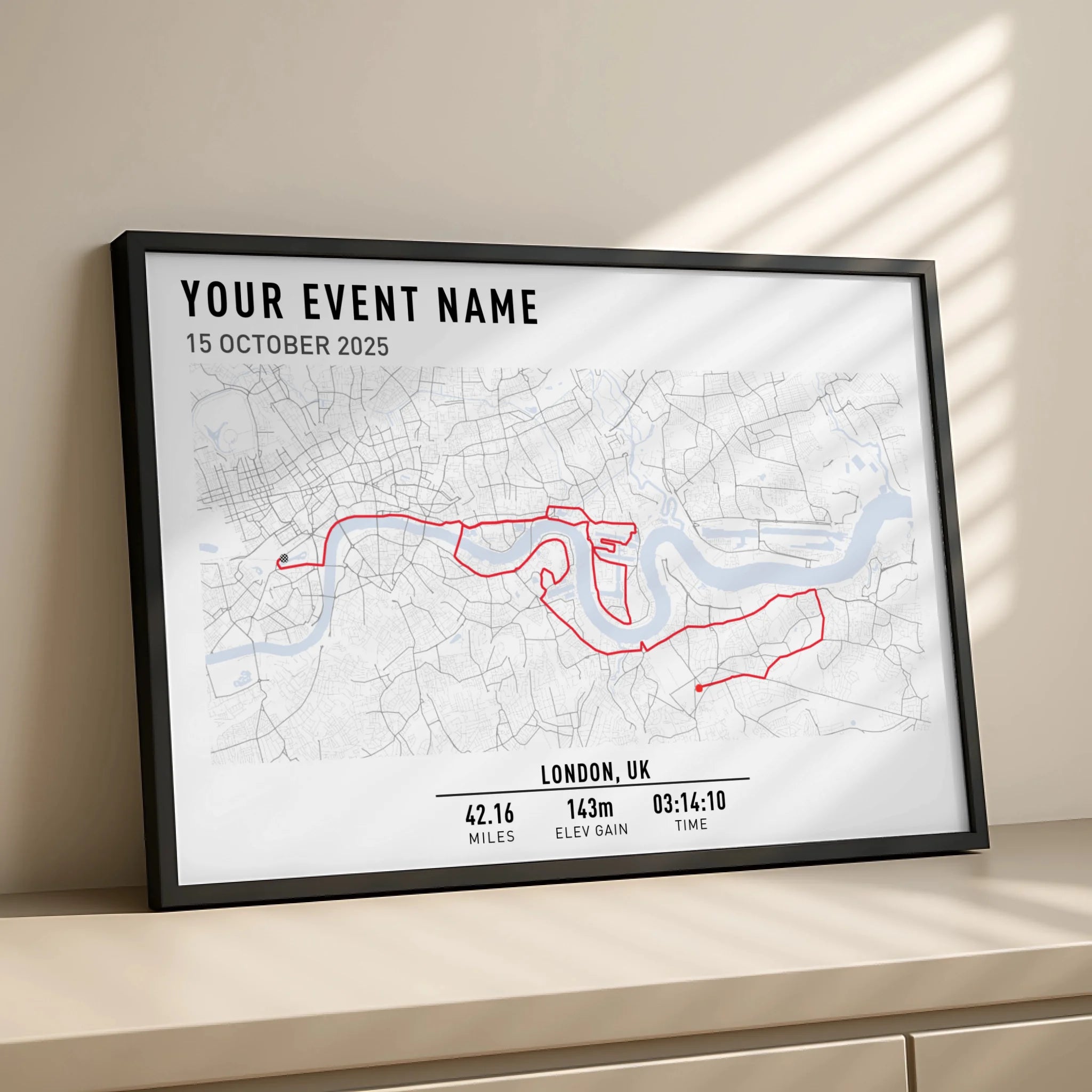 Close-up of a personalised GPX route map print in a modern frame