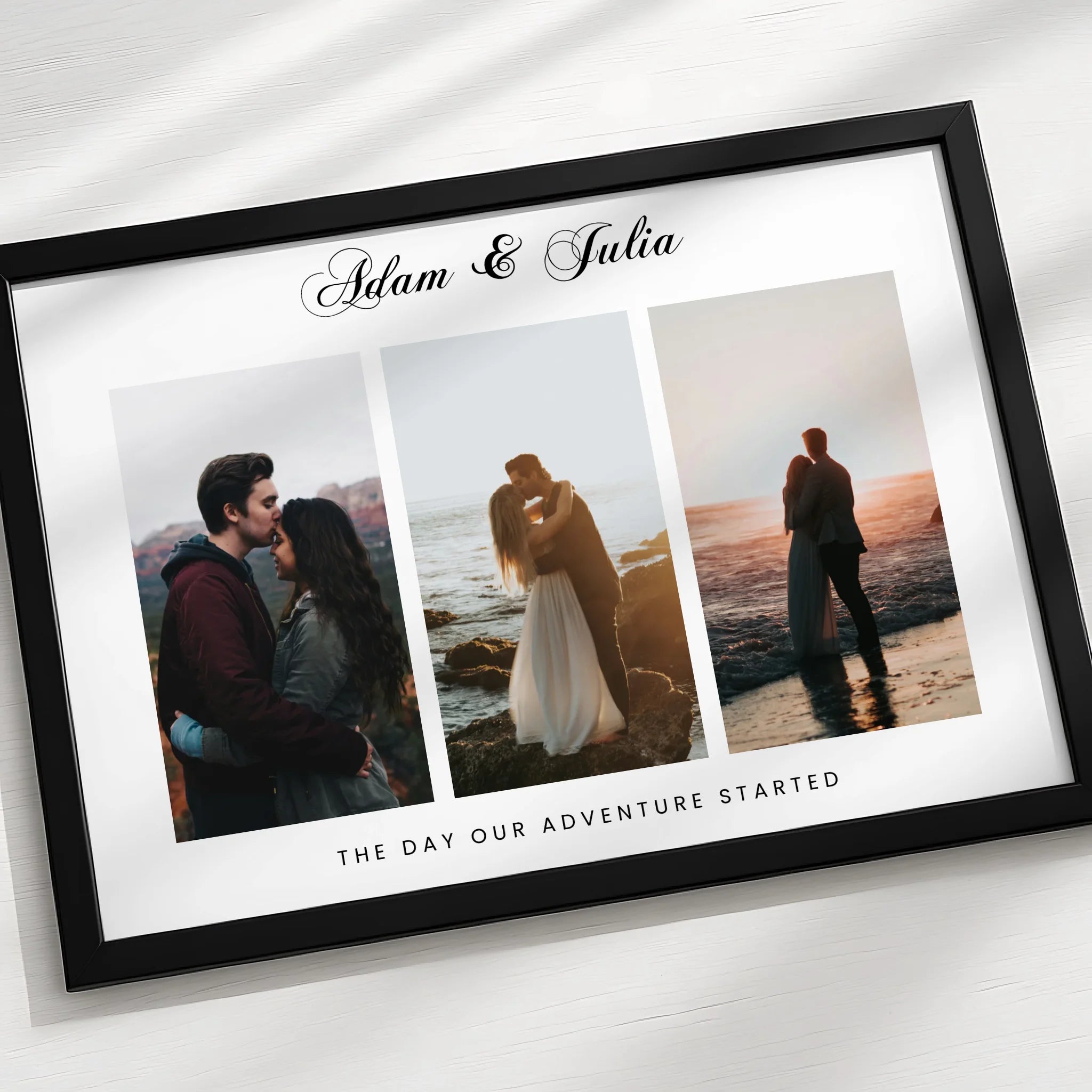 Black framed 3-photo personalised couple print flat lay style, showing Adam and Julia script and The Day Our Adventure Starte